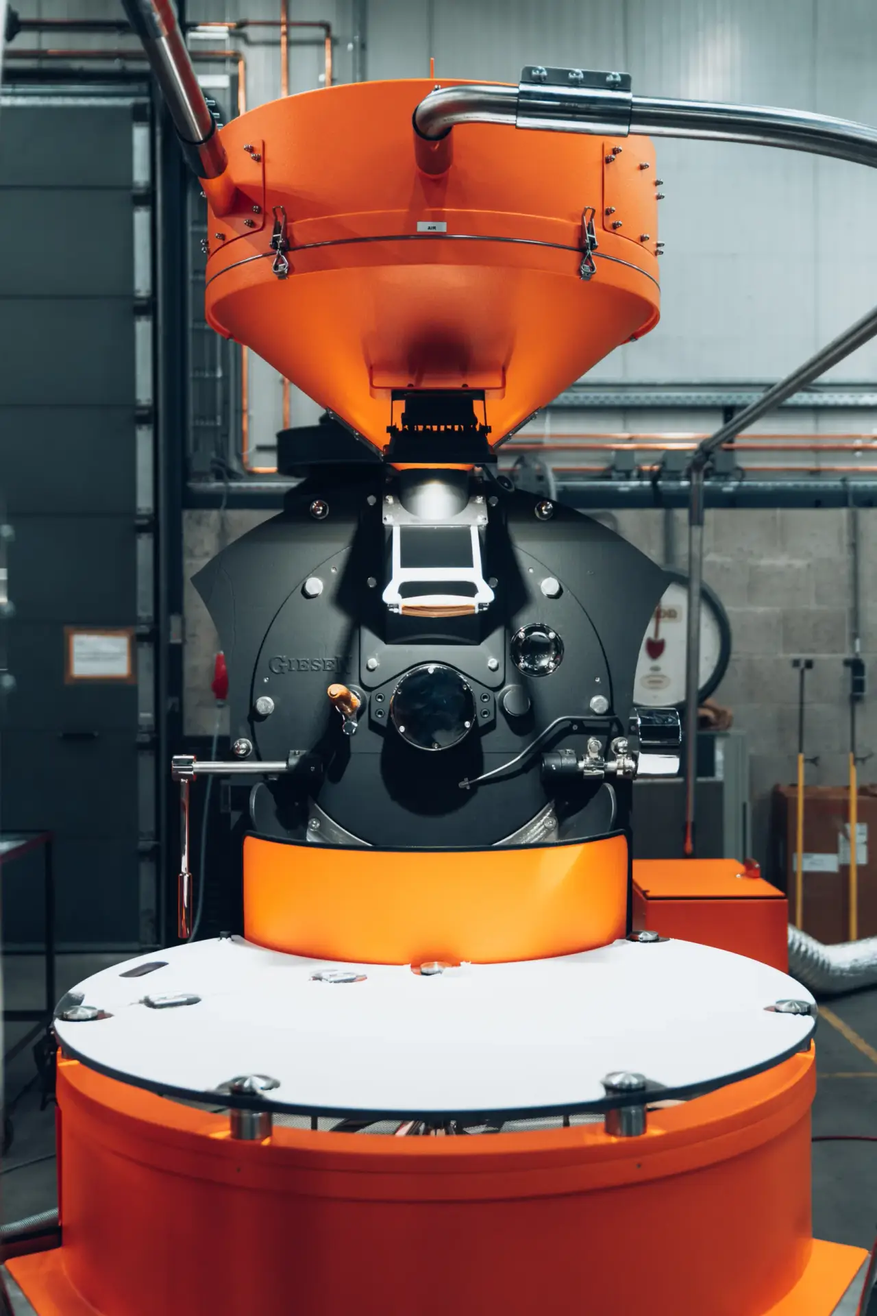 Giesen roaster with extraction ducting in a workshop
